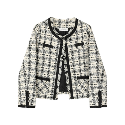 フリンジ ツイードジャケットの正面アップ。生地の質感とフリンジのディテールがわかる写真。