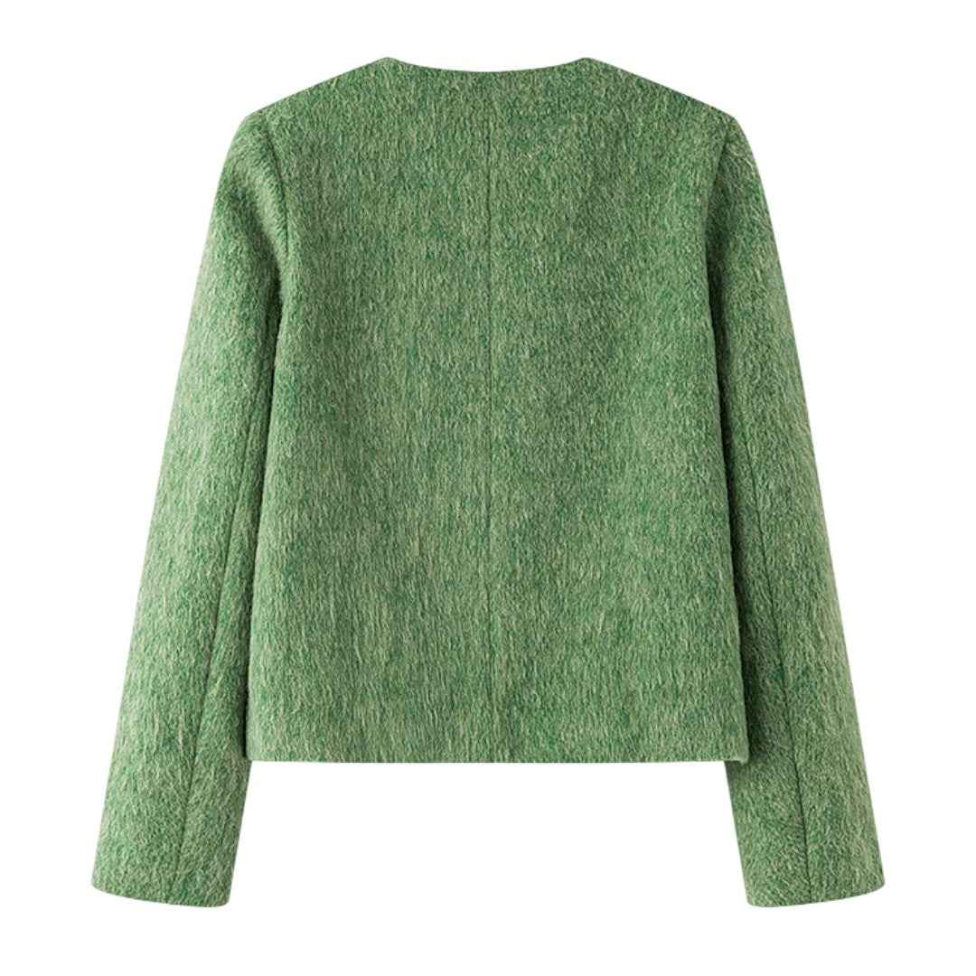 ウール混ツイードジャケットの背面デザイン。すっきりとしたバックスタイル。