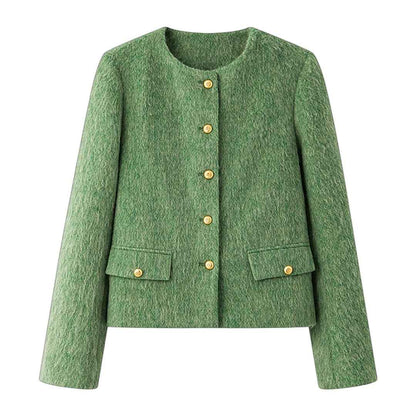 ウール混ツイードジャケットの正面アップ。ゴールドのボタンが特徴。