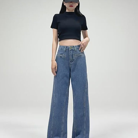 バックリボンワイドデニムを着用したモデルの全身正面ショット。ハイウエストとストレートシルエットがわかる動画。
