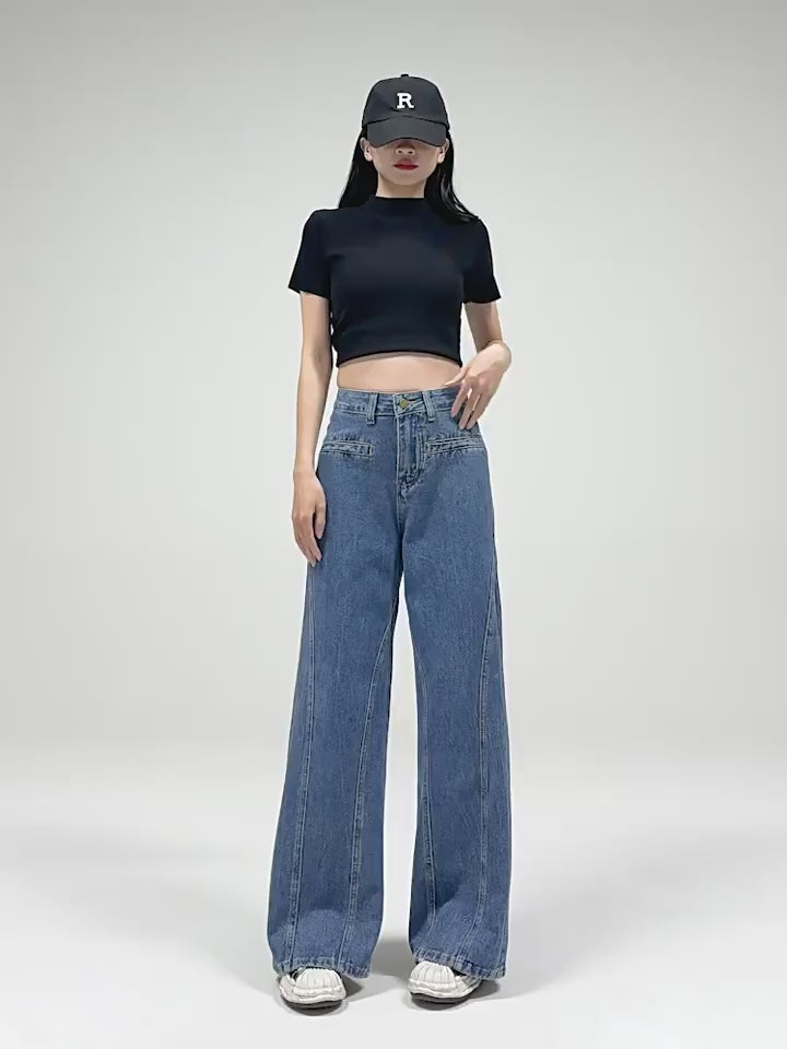 バックリボンワイドデニムを着用したモデルの全身正面ショット。ハイウエストとストレートシルエットがわかる動画。